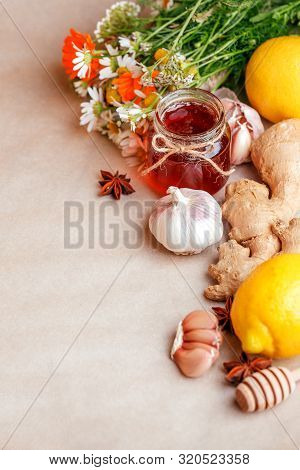 Lemon Ginger Honey Herbs On Table. Ingredients For Warm Drink Beverage For Cold Flu Winter Fall Days