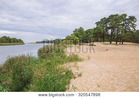 City Carnikava, Latvian Republic. Green Nature In Summer With River Gauja And Waves. Travel Photo. S
