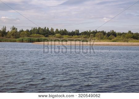 City Carnikava, Latvian Republic. Green Nature In Summer With River Gauja And Waves. Travel Photo. S