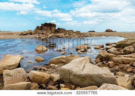 Rock Formation Against Sky In Sillon De Talbert Area