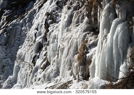 Big Icefall In Mountain At Nice Winter Day