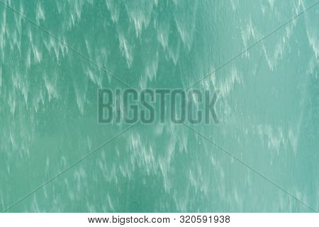 Close Up Of Surface. Blue Or Turquoise Waterfall Or Swimming Pool Texture. Pattern Background Of Wat