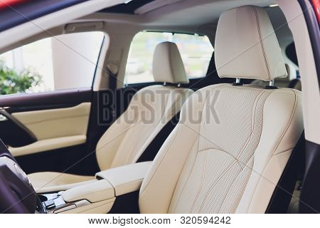 Car Inside Driver Place. Interior Of Prestige Modern Car. Front Seats With Steering Wheel Dashboard.
