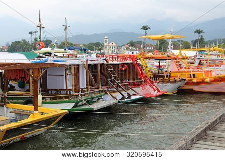 Paraty, Brazil - October 14, 2014: Colorful Boats In Paraty (state Of Rio De Janeiro). The Town Date