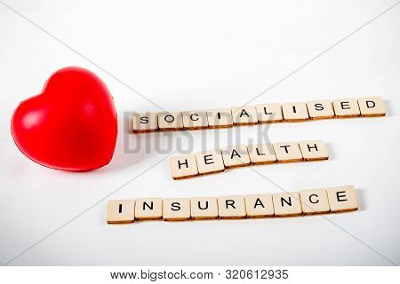Healthcare Concept Showing A Heart And The Message Socialised Health Insurance