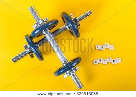 Healthcare Concept Showing Dumbbells And The Message Feel Better