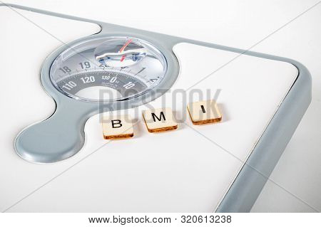 Healthcare Concept Showing Bathroom Scales And The Message Bmi