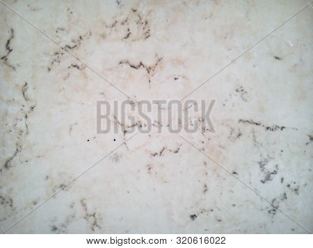 Close-up Of Pink Marble With Dark Streaks And Splashes