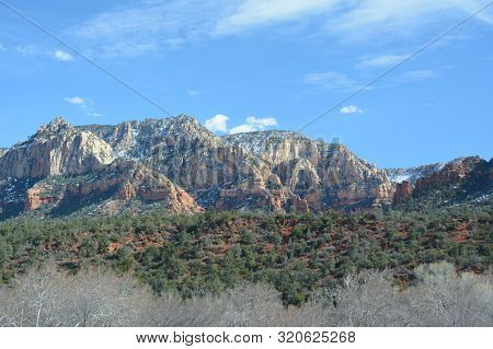 Scenic Late Winter Landscape Of Notable Red Rock Formations In The Vicinity Of Sedona, Northern Ariz