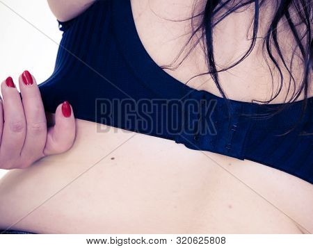 Fat Woman Rear View Opening Taking Off Or Putting On Her Bra. Plus Size Overweight Female Model Wear