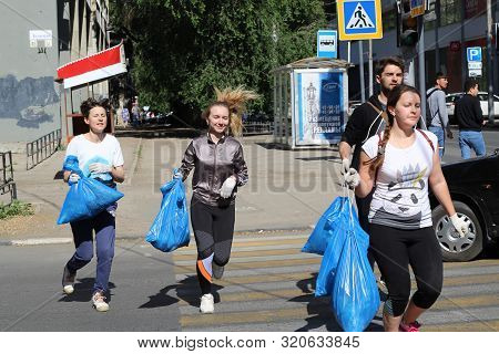 Plogging. Young People Are Happy That They Managed To Collect City Garbage. Saratov, Russia, 10 June