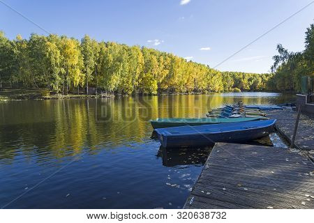 Closed Boat Station On The Pond In The Fall.