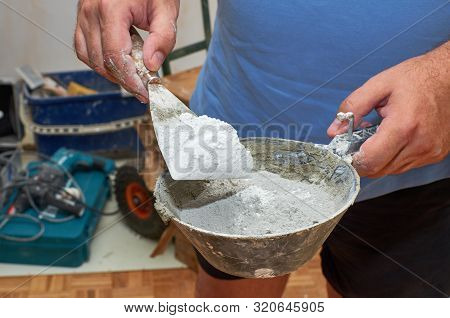 Scraper And Plasterer's Pan With Gypsum Powder