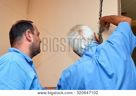 Repairing Works On A Wall