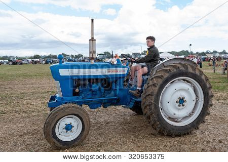 Haselbury Plucknett.somerset.united Kingdom.august 18th 2019.a Restored Vintage Ford 4000 Tractor Is