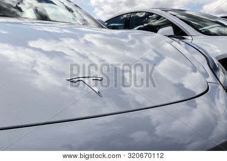 Indianapolis - Circa September 2019: Tesla electric vehicles awaiting preparation for sale. Tesla EV Model 3, S and X are a key to a cleaner and greener environment XIII