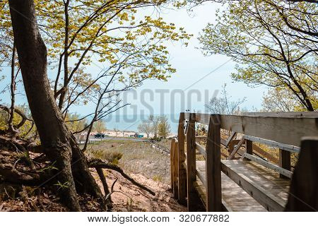 Looking Out From The Wooded Part Of The Boardwalk At Lake Michigan