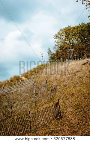 Looking Up At A Large Sand Dune Off Of Lake Michigan