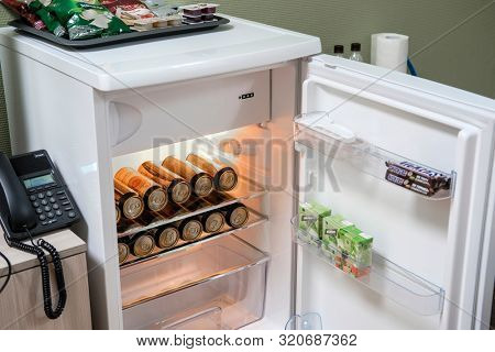 Mosocw region, Russia - August, 23, 2019: beer cans in the fridge in a hotel room in Moscow region, Russia