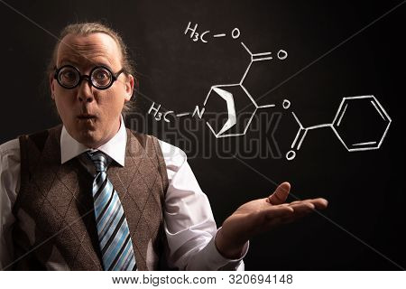 Professor Presenting Handdrawn Chemical Formula Of Cocaine