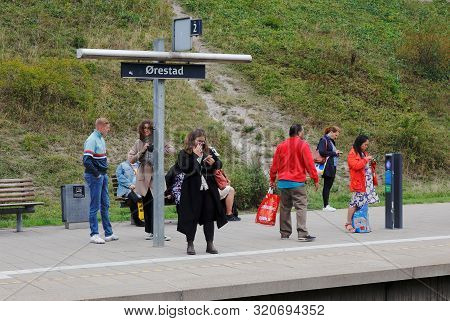 Copenhagen, Denmark - September 5, 2019: People Waiting At Track Two At The Orestad Railroad Station