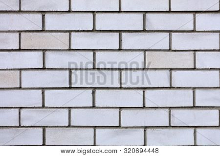 White And Gray Brick Wall Texture Closeup