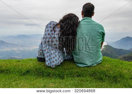 Couple Isolated Soaking Up Natural Beauty From Hill Top Image Is Showing The Human Love Towards The 