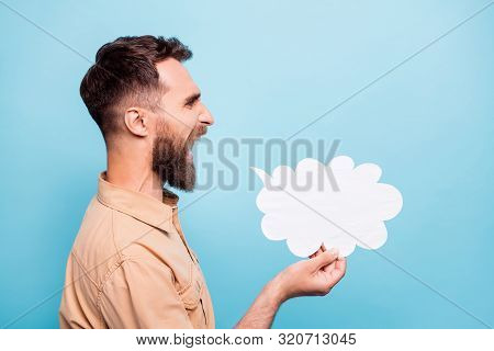 Profile Side Photo Of Shouting Man Holding Paper Card Cloud Wearing Brown Shirt Isolated Over Blue B