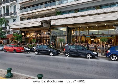Thessaloniki, Greece - August 15 2019: People Enjoy Coffee At City Center Cafe Bars. Unidentified Cr