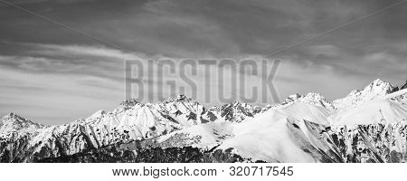 Sunlight Snowy Mountains And Sky With Clouds In Sunny Day. Caucasus Mountains At Winter. Georgia, Re