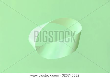 Mobius Strip Soaring In The Air On Mint Background