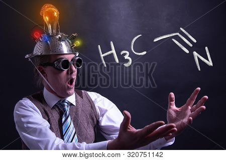 Nerd Presenting Handdrawn Chemical Formula Of Acetonitrile