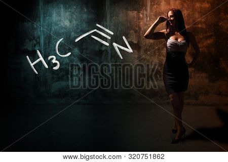 Sexy Girl Or Secretary Or Female Student Presenting Handdrawn Chemical Formula Of Acetonitrile