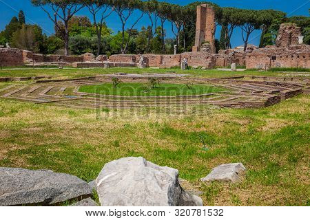 Rome, Italy - April, 2018: Tourists Visiting The Peristyle With Octagonal Island At The Flavian Pala