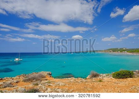 View On The Beach Son Bou On The Balearic Island Menorca, Spain With Beautiful Blue Water Color And 