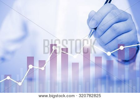 Businessman Drawing Business Target Diagram, Performance Indicator In Virtual Screeen, Stock Market 