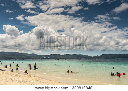 Balabag, Boracay Island, Philippines - March 4, 2019: White Beach Shows Sand And Azure Sea With Mala