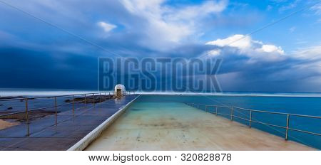 Stormy Winters Day At Merewether Ocean Baths - Newcastle Nsw Australia. These Ocean Baths Are A Icon