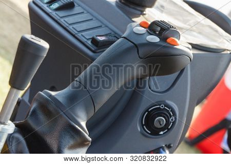 Operating Control Panel With Buttons In Agricultural Or Industrial Machine. Detail Of Vehicle