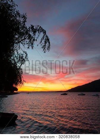 Beautiful And Spectacular Sunset On The Banks Of Lake Ranco, In The Small Village Of Llifen. Los Rio