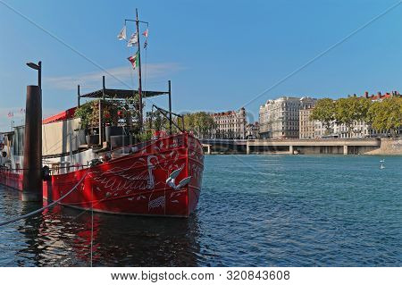Lyon, France, September 6, 2019 : Barges On The Shore Of Rhone River. The Modern Berges Du Rhone Res