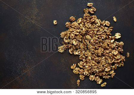 Heap Of Raw Peelled Organic Walnuts. Top View With Copy Space.