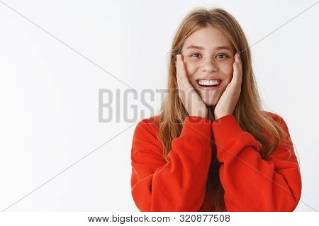 Surprised Girl Seeing Changes On Face Pressing Hands To Cheeks Amazed And Happy Smiling Broadly Afte
