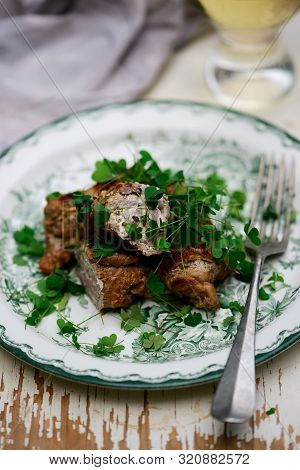 Veal Saltimbocca With Sorrel..selective Focus. Style Rustic