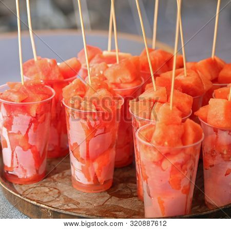 Red Pieces Of Watermelon For Sale In The Glasses