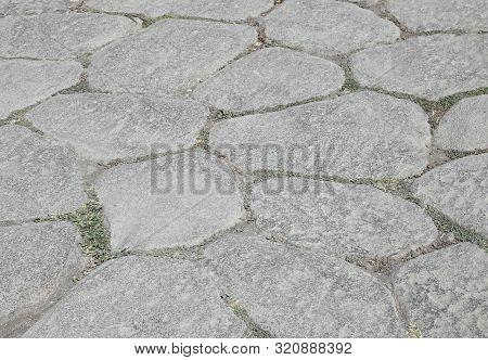 Background Of Old Stones Of An Ancient Roman Road