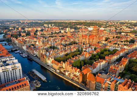Gdansk Is A City In Poland. Gdansk In The Morning Rays, The Sun Is Reflected From The Roofs Of The O