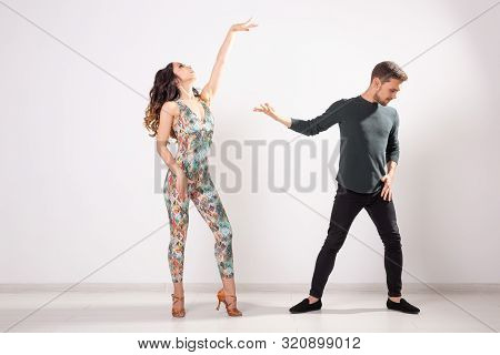 Passionate Couple Dancing Social Danse Kizomba Or Bachata Or Semba Or Taraxia On White Background Wi