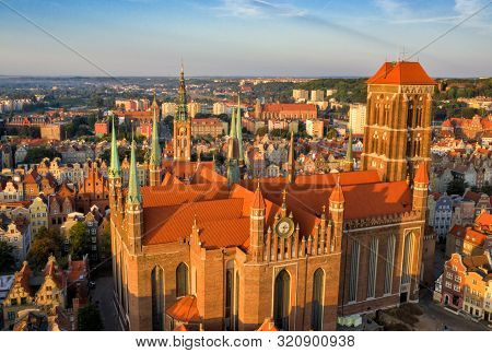 Gdansk Is A City In Poland. Gdansk In The Morning Rays, The Sun Is Reflected From The Roofs Of The O