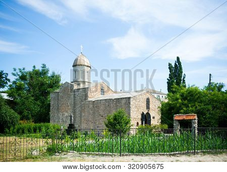 Small Old Stone Church In A Small Town